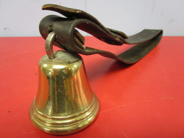 lot 359 image: VINTAGE SOLID BRASS BELL WITH LEATHER BELT