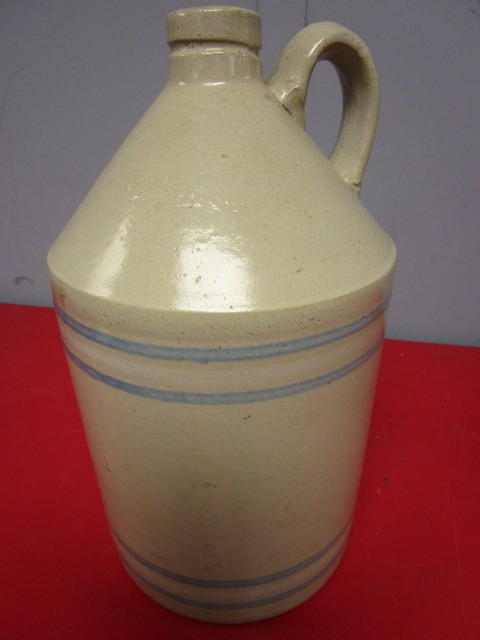 lot 373 image: VINTAGE CLAY JUG