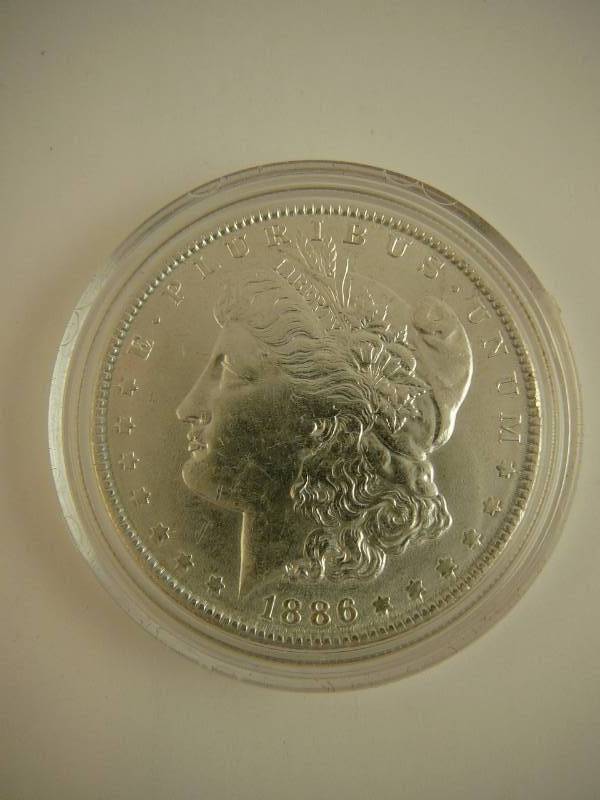 lot 5 image: 1886 Morgan Silver Dollar