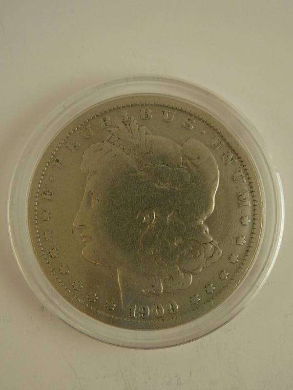 lot 100 image: 1900 O Morgan Silver Dollar