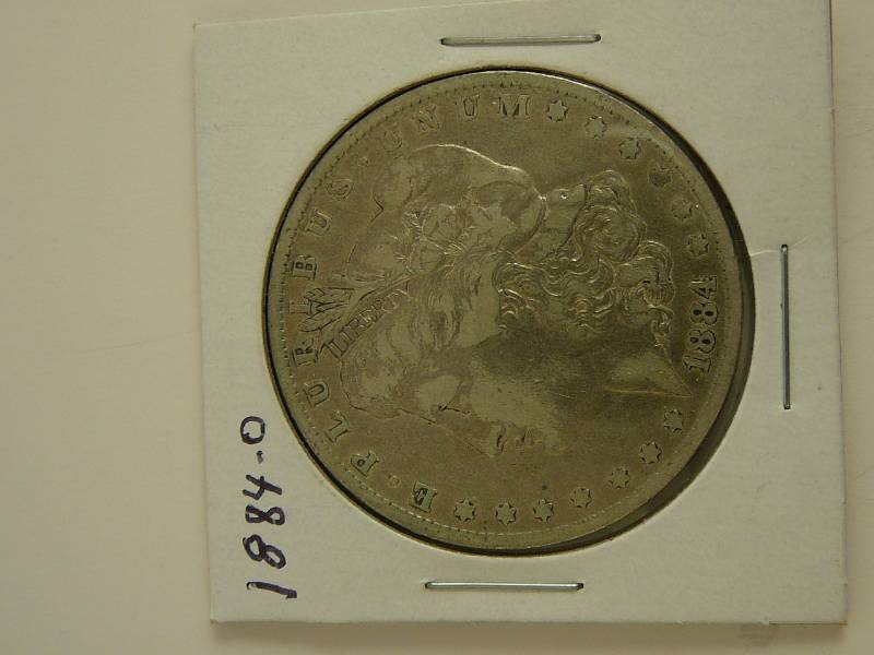 lot 119 image: 1884 O Morgan Silver Dollar