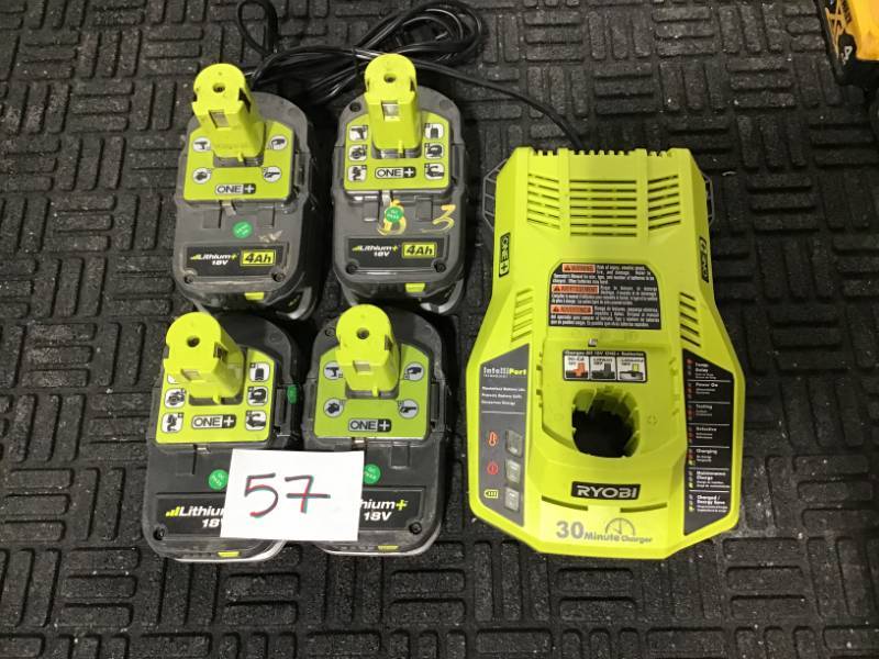 lot 57 image: Lot of 4 Ryobi Batteries & Charger Lot of 4 includes two 2Ah and two 4Ah batteries & one Ryobi 30-minute fast charger- USED