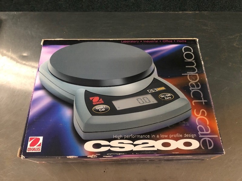lot 12 image: MSRP $200 Ohaus- CS200 - Compact Portable Laboratory Science Digital Scale&nbsp200 grams weighing capacity with 0.1 gram precision - Like New Condition