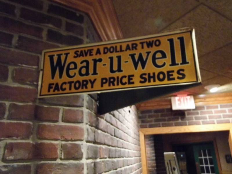 lot 321 image: Wear U Well Metal Sign