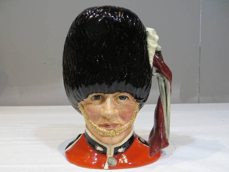 lot 70 image: Royal Doulton The Guardsman Toby Mug