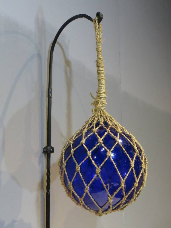 lot 100 image: Blue Glass Buoy Garden Decor