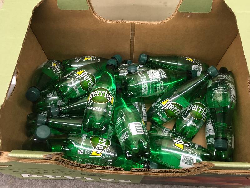 lot 529 image: Box Of Perrier Carbonated Mineral Water