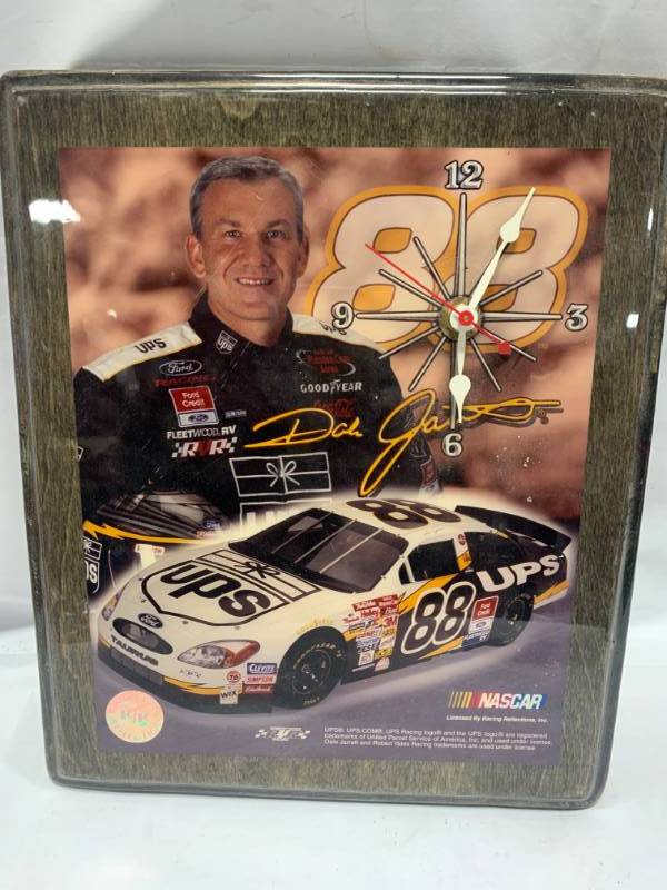 lot 63 image: Dale Jarrett #88 UPS Vintage Clock Plaque