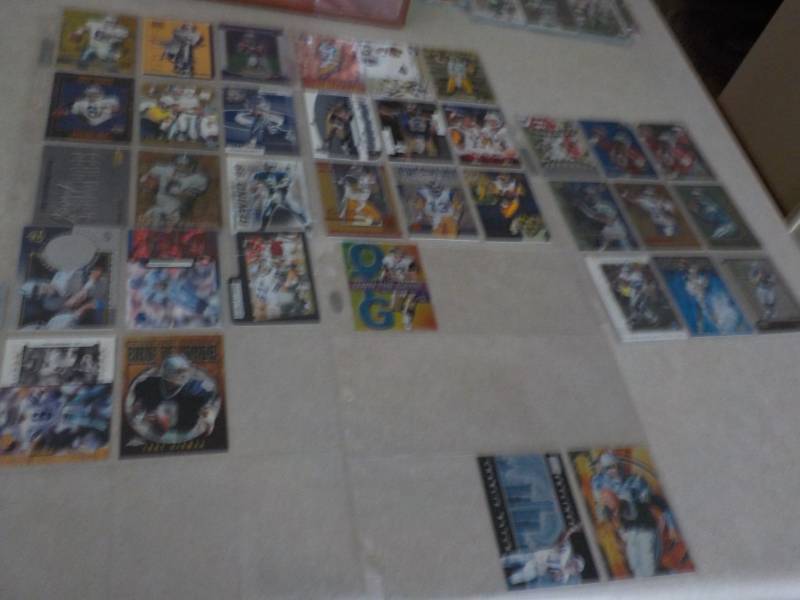 Troy Aikman, Kurt Warner, and Charl...