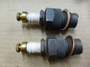 lot 124 image: New Antique Spark Plugs