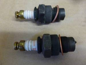 lot 125 image: New Antique Spark Plugs