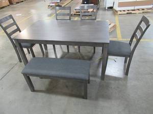lot 256 image: Ashley Furniture Signature Design - Dining Room Table and Chairs with Bench (Set of 6) - Gray, Corner of Table is Chipped  and Top has some slight scratches(See Photos).