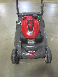lot 350 image: Honda HRX NeXite Deck 21 in. GCV200 Electric Start Self Propelled Walk Behind Gas Hydrostatic Mower with Roto-Stop & Versamow HRX217HZA