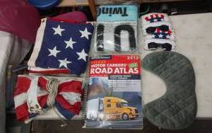 lot 10 image: 3x5 Flag, 5x10 Flag Atlas, Travel Pillow, License Plate, Throw