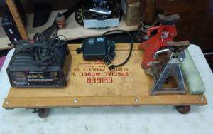 lot 21 image: Creeper, Battery Charger, 3-Jack Stands, 12-Volt Compressor