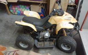 lot 36 image: 110 CC Youth 4-Wheeler For Parts Or Repair. Has Broken Frame