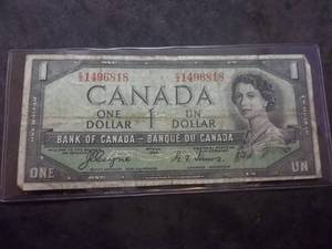 lot 69 image: 1954 Canada One Dollar (Devils Hair) Bill