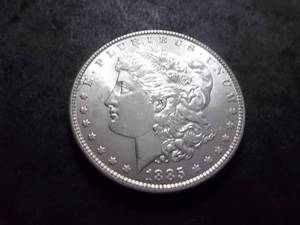 lot 13 image: 1885 Morgan Silver Dollar