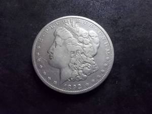 lot 24 image: 1892 O Morgan Silver Dollar