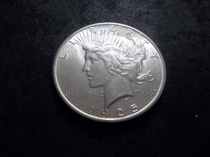 lot 49 image: 1925 Peace Silver Dollar