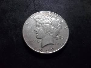 lot 53 image: 1927 S Peace Silver Dollar