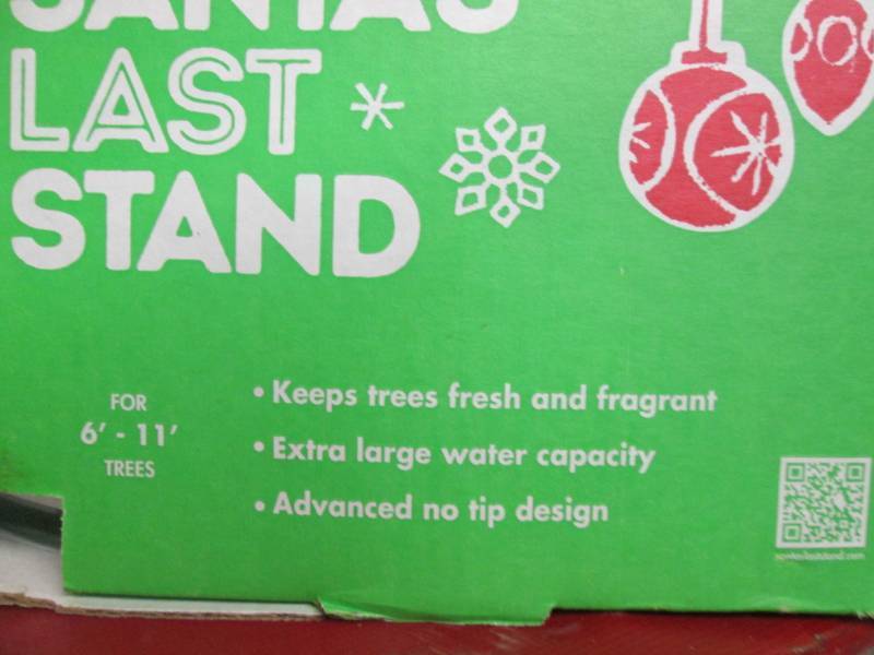 lot 199 image: Christmas Tree Stand 6-11 Tree 2...
