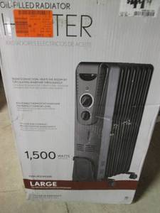 lot 21 image: Unknown Brand Oil Filled Heater (Large) 1500W Open Box Untested Pallet