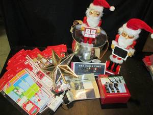 lot 31 image: 2 Santa Nutcrackers, Star Works, Gift Tags, Dads Coupon Book, Scrap Booking Foil, Metal Bucket, Stocking Hooks 11