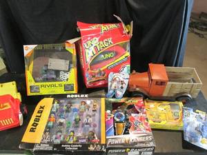 lot 43 image: Uno Attack, Power Rangers, Toy Trucks, Pokemon Cars, Roblox, Hex Bug 12