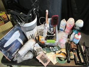 lot 45 image: Hair Accessories- Open Packaging- Ceramic Hair Dryer, Electric Razor, Curling Iron, Straightener, SunglassesReaders, Brushes, Laundry Detergent, Contact SolutionCleaner,Small Trash Bin With Wire Hangers 12