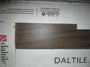 lot 64 image: 6 Cases Ceramic Tile (Brown) & 14 Container of Sanded Grout