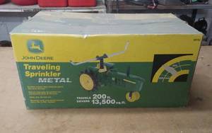 lot 72 image: John Deere Tractor Sprinkler