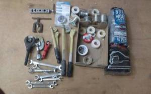 lot 105 image: Steel Wool, Spools Of Solder & Wrenches