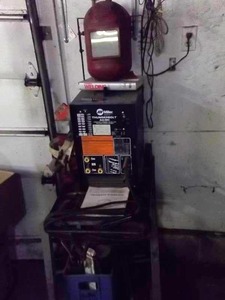 lot 154 image: Miller Thunderbolt ACDC Welder, 230-Volt, With Accessories & Stand