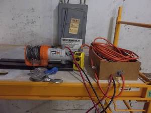 lot 160 image: Warn 1700 Lb 12-Volt Hoist