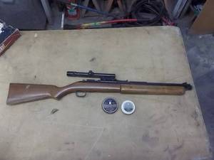 lot 203 image: Sheridan Blue Streak 5 mm Pump Pellet Gun With Scope & 2-Tins Of Pellets