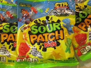 lot 92 image: 12 Bags of Sour Patch Kids Candy Be...