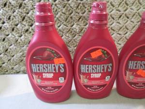 lot 133 image: 4 Bottles of Hersheys Strawberry Sy...
