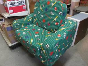 lot 154 image: Kids Sports Chair Folds out to bed....