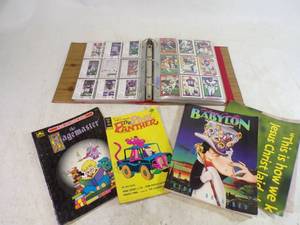 lot 7 image: Binder with Football Cards, The Pink Panther Comic book and more
