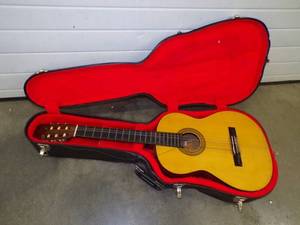 lot 12 image: Guitar with Case