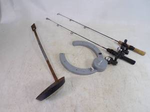 lot 33 image: Pair of Ice Rods with Reels, Ice Scooper and Hole Light