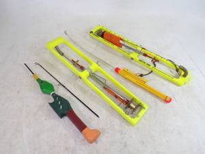 lot 34 image: Pair of Tip Ups and Ice Rod