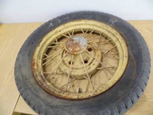 lot 53 image: Antique Tire w Rim