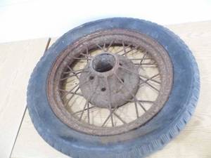 lot 54 image: Antique Tire w Rim