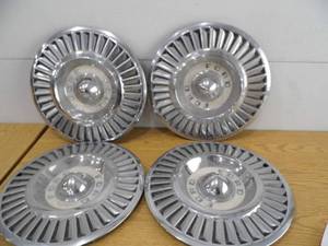 lot 59 image: Lot of 4 Ford Thunderbird Hubcaps