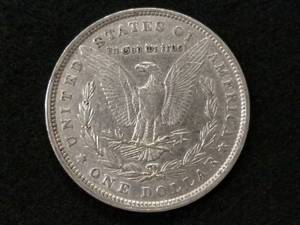 lot 8 image: 1880 Morgan Silver Dollar...