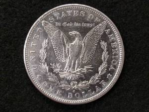 lot 14 image: 1882 S Morgan Silver Dollar...