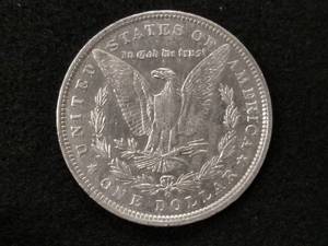 lot 23 image: 1890 O Morgan Silver Dollar...
