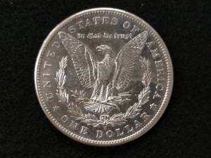 lot 24 image: 1890 S Morgan Silver Dollar...